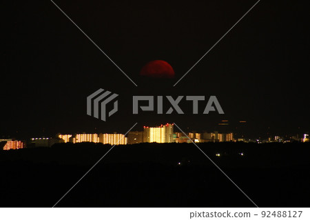 The sinking, distorted red moon 92488127