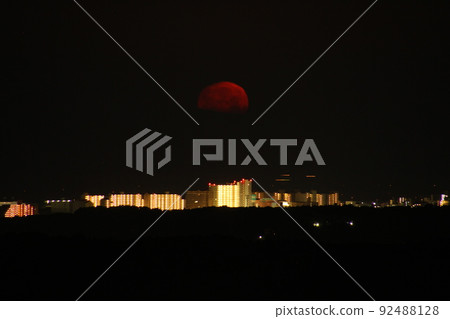 The sinking, distorted red moon 92488128
