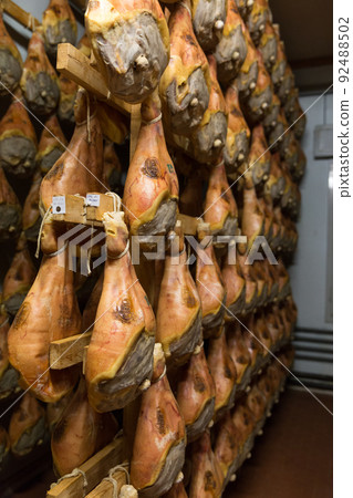 Storage of prosciutto in a ham factory in Bologna, Italy 92488502