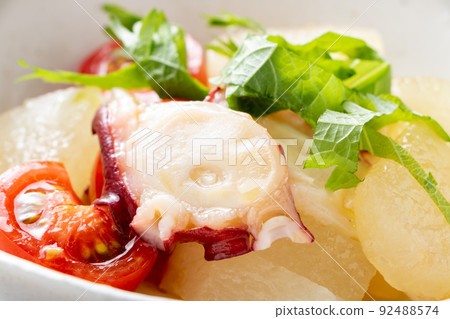 Wax gourd and octopus salad. (It's called "winter" melon, but it's a vegetable that is in season in summer.) Wax gourd and octopus salad. (It's called "winter" melon, but it's a vegetable that is in season in summer.) 92488574