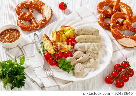Weisswurst, white sausage of minced veal and pork Weisswurst, white sausage of minced veal and pork 92488640
