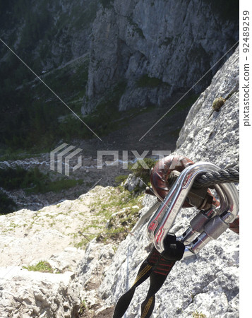 Via ferrata at high mountain lake Seebensee, Zugspitze mountain, Tyrol, Austria 92489259