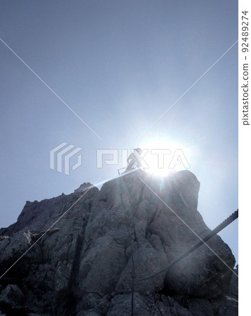 Via ferrata at high mountain lake Seebensee, Zugspitze mountain, Tyrol, Austria 92489274