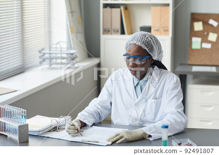 Lab Technician Writing in Document 92491807