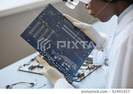 Inspecting Tech Parts in Lab 92491937