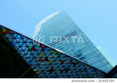 low angle view of singapore city buildings. low angle view of singapore city buildings. 92492594