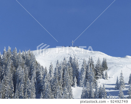Summit cross of Seekarkreuz mountain, Bavaria, Germany Summit cross of Seekarkreuz mountain, Bavaria, Germany 92492749