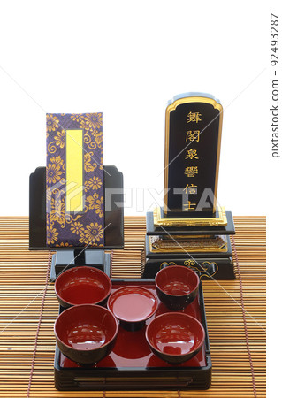 An altar on a tray, a past book and a mortuary tablet displayed on a tray An altar on a tray, a past book and a mortuary tablet displayed on a tray 92493287