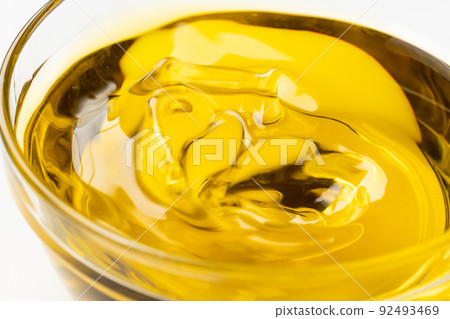 Shaking and rippling olive oil Shaking and rippling olive oil 92493469