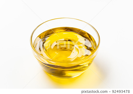 Shaking and rippling olive oil 92493478