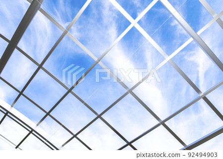 Lattice metal frame on blue sky background 92494903