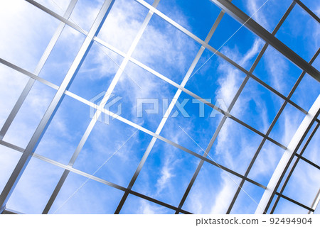 Lattice metal frame on blue sky background 92494904