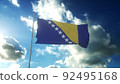 Flag of Bosnia and Herzegovina waving at wind against beautiful blue sky. 3d illustration 92495168