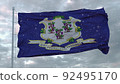 Connecticut winter flag with snowflakes background. United States of America. 3d illustration 92495170