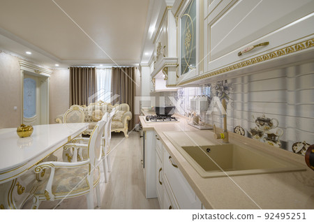 Renovated Interior of rich classic white kitchen Renovated Interior of rich classic white kitchen 92495251