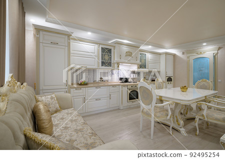 Renovated Interior of rich classic white kitchen 92495254