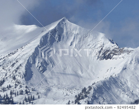 Winter hiking tour to Pendling mountain, Tyrol, Austria 92495482