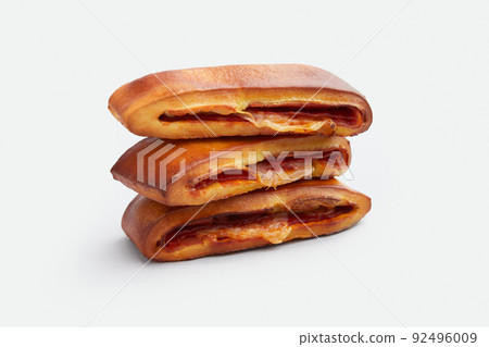 Lanche misto traditional portuguese sandwich with cheese and chorizo. Tasty breakfast over white background 92496009