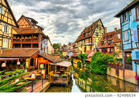 Traditional half-timbered houses in the Little Venice district of Colmar - Alsace, France 92496634