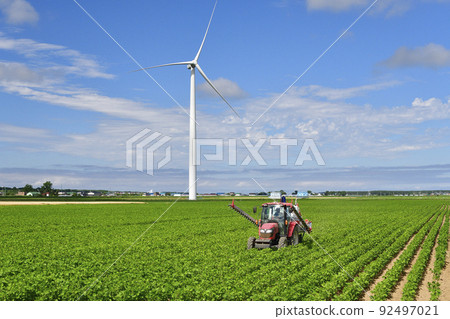 Photographing the scenery of soybean field control work in Esashi-cho, Hokkaido in the summer 92497021