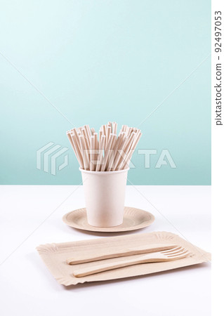 Eco friendly disposable tableware. Paper plates, cups, straws and wooden cutlery. Zero waste, plastic free items.  92497053