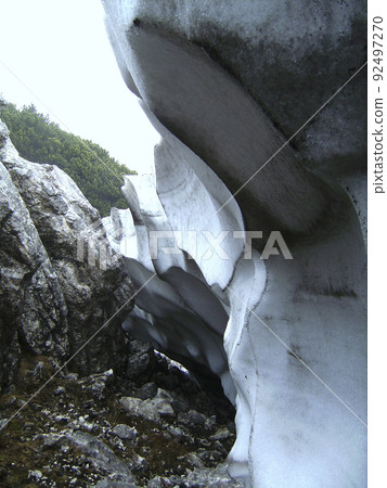 Residual snow at Pyramidenspitze mountain hiking tour in Tyrol, Austria 92497270