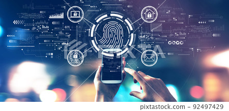 Fingerprint scanning theme with city lights at night 92497429