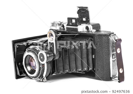 film camera on a white background with an accordion lens isolate 92497636