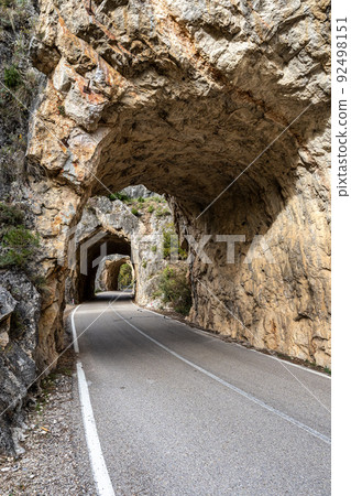 Tunnel hole at Serrania de Cuenca in Spain near Cuenca and Fuertescusa. Door to hell 92498151