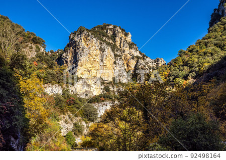 Driving through Foz de Arbayun canyon of Salazar River in the Pyrenees in Spain Driving through Foz de Arbayun canyon of Salazar River in the Pyrenees in Spain 92498164