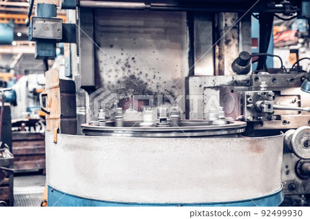 Assembly workshop at big industrial plant. Tractor assembling Assembly workshop at big industrial plant. Tractor assembling 92499930