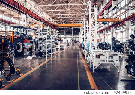 Assembly workshop at big industrial plant. Tractor assembling 92499932