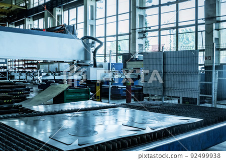 Assembly workshop at big industrial plant. Tractor assembling 92499938