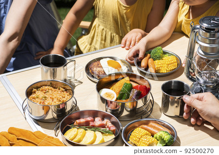 Family enjoying outdoor camping Family enjoying outdoor camping 92500270