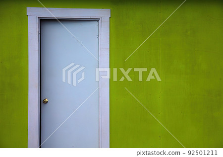 open door entrance bright green wall background exit solution choice 92501211