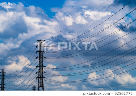 Cumulonimbus clouds rising in the high-voltage power transmission line and blue sky b-2 High-saturation contrast Cumulonimbus clouds rising in the high-voltage power transmission line and blue sky b-2 High-saturation contrast 92501775