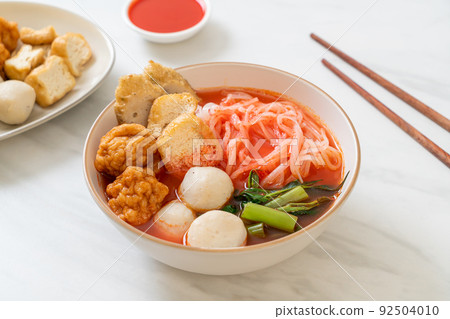 small flat rice noodles with fish balls and shrimp balls in pink soup, Yen Ta Four or Yen Ta Fo small flat rice noodles with fish balls and shrimp balls in pink soup, Yen Ta Four or Yen Ta Fo 92504010