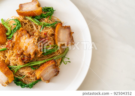 Stir-fried rice vermicelli and water mimosa with crispy pork belly 92504352