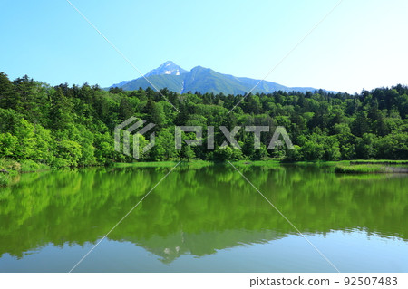 Early summer Himenuma Mt. Rishiri with residual snow Early summer Himenuma Mt. Rishiri with residual snow 92507483