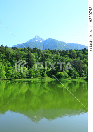 Early summer Himenuma Mt. Rishiri with residual snow 92507484