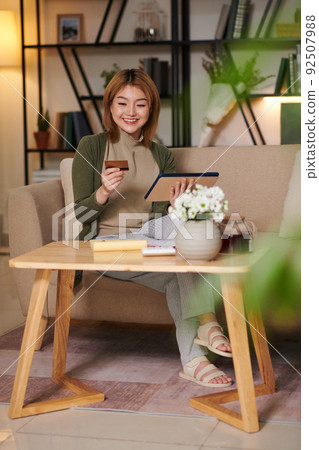 Woman Shopping Online with Credit Card Woman Shopping Online with Credit Card 92507988