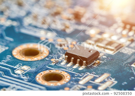 Close-up of computer chip on a Computer graphics card with sunlight Close-up of computer chip on a Computer graphics card with sunlight 92508350