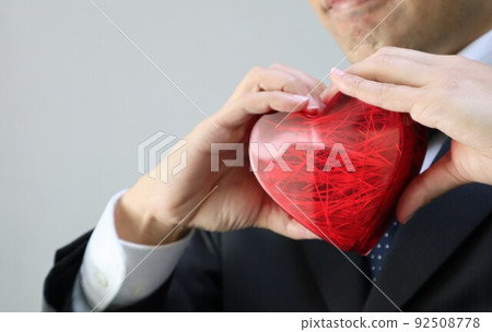 Close-up of a person with a heart 92508778