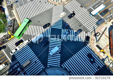 Colorful vehicles passing through the Ginza scrambled intersection 92510278