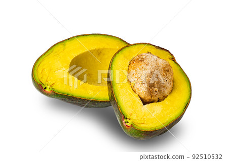 Half ripe avocado fruit with seed isolated on white background. 92510532