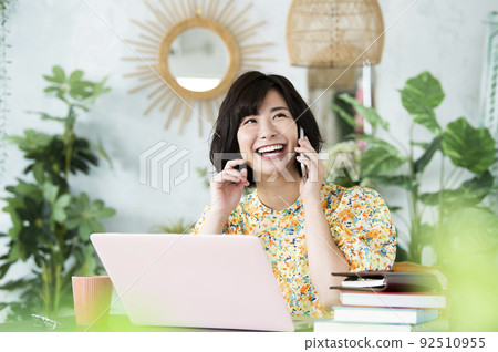 Female telework remote work smartphone call Female telework remote work smartphone call 92510955