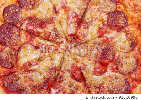 Pepperoni Pizza top view close-up macro shot 92510980