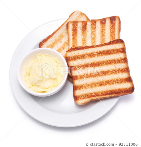 Toasted or grilled bread slices and butter isolated on white background 92511006
