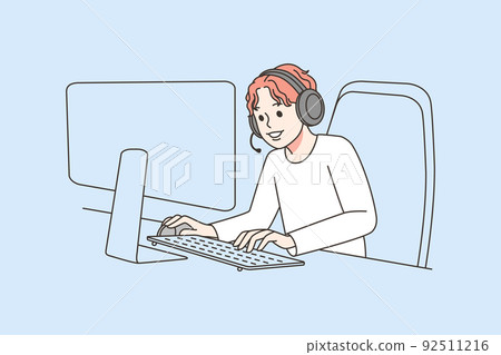 Boy playing video games on computer  92511216
