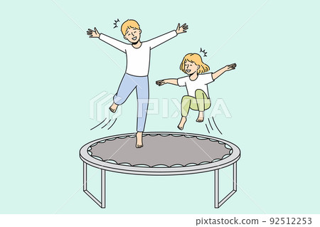 Happy kids jumping on trampoline Happy kids jumping on trampoline 92512253